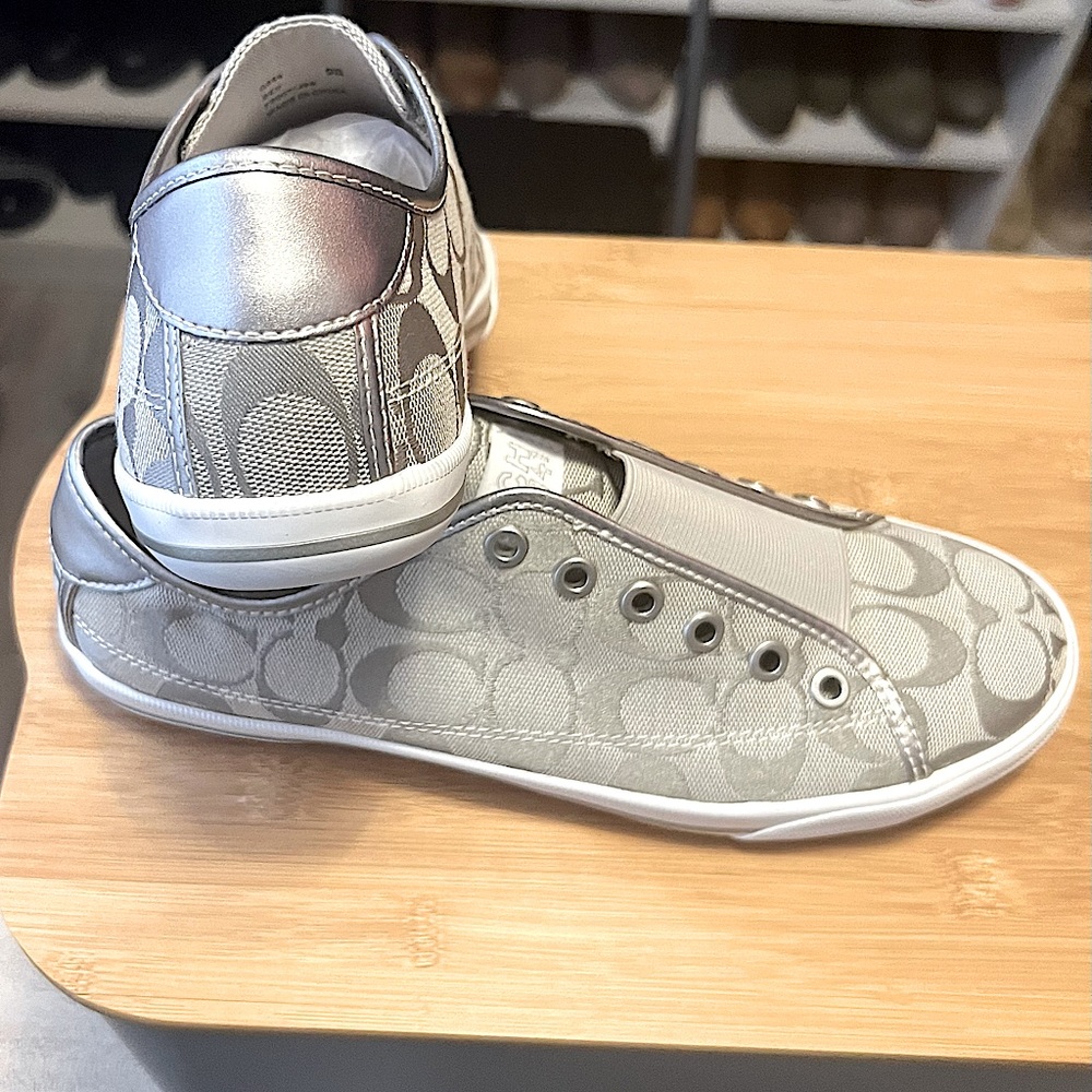 Brand New Coach Bev Signature “C” Silver and White Casual Slip On Sneakers